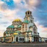 St. Alexander Nevsky in the center of Sofia, Bulgaria’s capital against a blue morning sky with colorful clouds