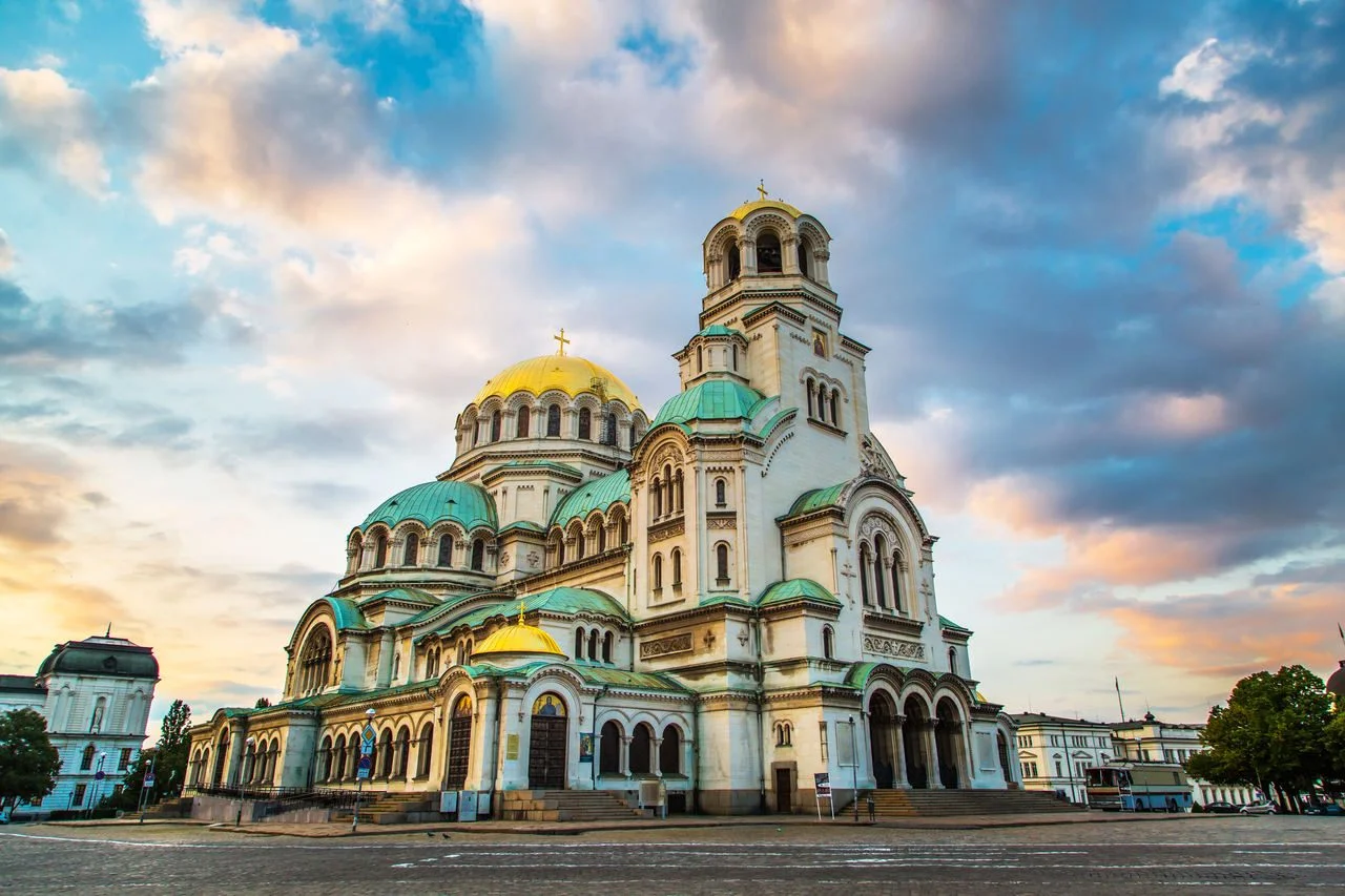 St. Alexander Nevsky in the center of Sofia, Bulgaria’s capital against a blue morning sky with colorful clouds
