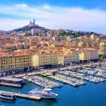 The old Port of Vieux and the Basilica of Notre Dame de la Garde in the historic center of Marseille, France