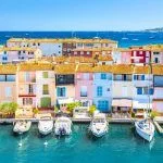 View Of Colorful Houses And Boats In Port Grimaud During Summer Day-Port Grimaud, France