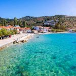 View to the beautiful village of Platanias at South Pelion Mountain, Greece, with turquoise sea along the marina