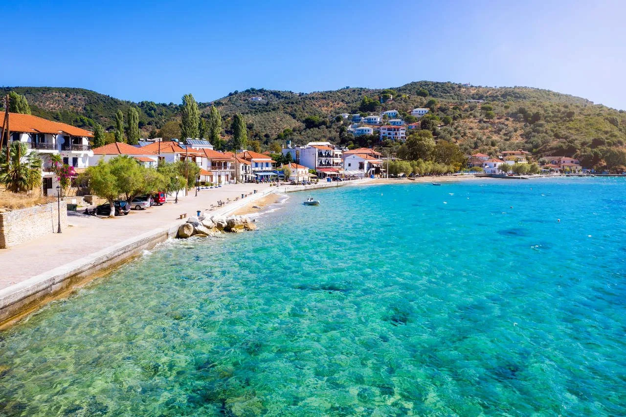 View to the beautiful village of Platanias at South Pelion Mountain, Greece, with turquoise sea along the marina