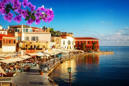 the bay of Chania on a sunny summer day, Crete Greece with flowers