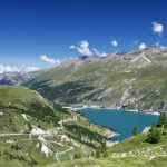 A summer hike in Vanoise National Park displays Tignes ski resort and peaceful environment for family outoor activities