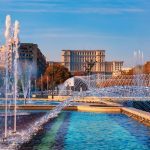 Famous building of Parliament house in Bucharest, the bigest landmark of Romania near the new fountains of capital.