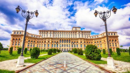 Fantastic architecture Palace of the Parliament of Bucharest at sunny day. Dramatic summer view of Palace of the Parliament Bucharest city, Romania, Europe
