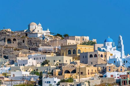 A panorama view towards the summit of the village of Pyrgos, Santorini in summertime