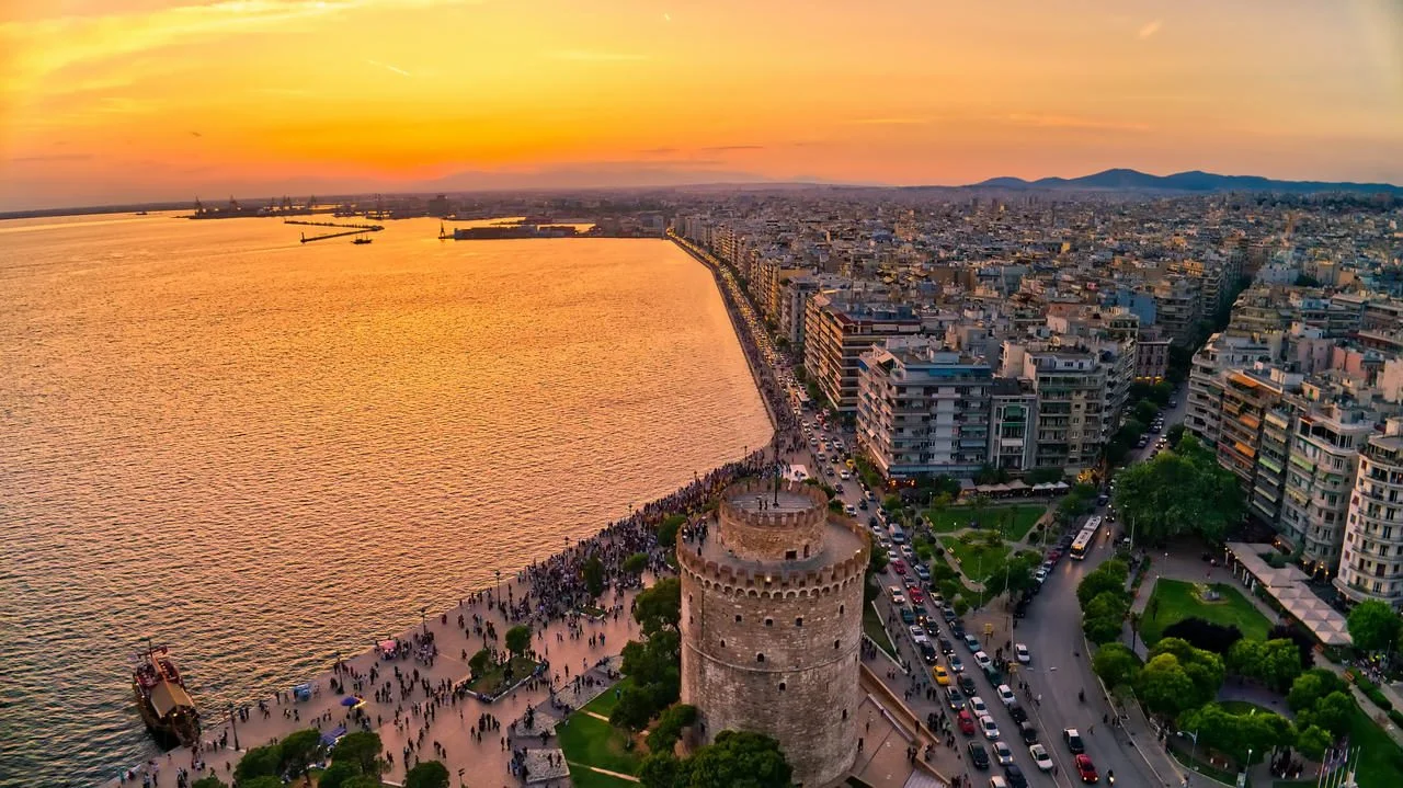 Aerial view of the White Tower of Thessaloniki at sunset view, Greece. Image captured with an action drone camera. HDR image
