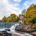Waterfall of Vanhakaupunki on Vantaanjoki river in Old Town Helsinki at autumn
