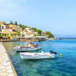 Boats in Kassiopi Bay in Corfu island, Greece