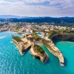 Canal D’Amour beach in Sidari, Corfu island, Greece. People bathing in the sun. Turquoise water.