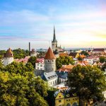 Late afternoon sunset view of the medieval walled city of Tallinn Estonia in early fall in the Baltic region of Northern Europe.