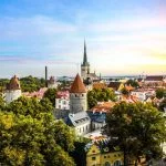 Late afternoon sunset view of the medieval walled city of Tallinn Estonia in early fall in the Baltic region of Northern Europe.
