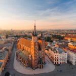 Krakow Market Square from above, aerial view of old city center view in Krakow at morning time, main square, famous cathedral in sun light_Easy-Resize.com