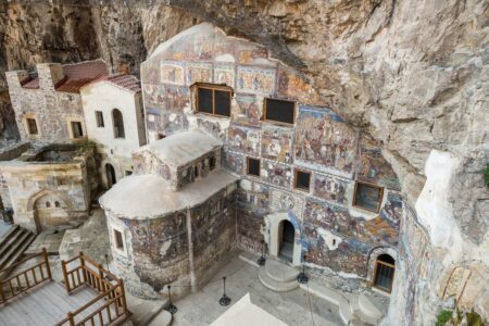 Ancient christian frescoes inside the Rock Church at Sumela Monastery in Trabzon, Turkey. Historic chapel covered with old christian icons inside the monastery