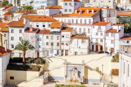 Signature white buildings in Coimbra city, Portugal