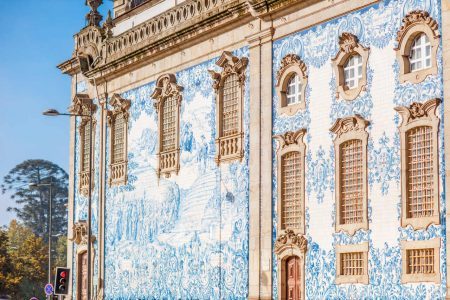 Facade view on the church wall with famous poruguese blue tiles Azulejo in Porto city in Portugal