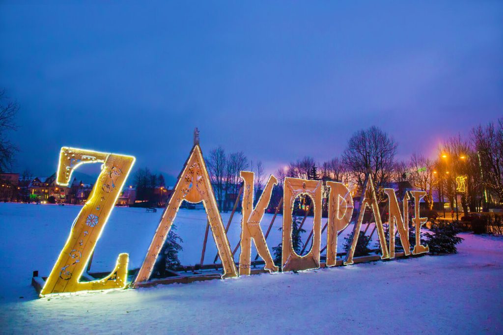 Zakopane sign near Krupowki Street during winter